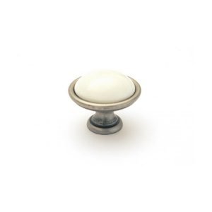cream ceramic drawer knob on old steel finish